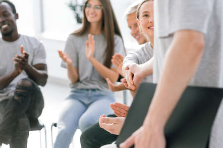 group of listeners applauding the speaker at the seminar.の写真素材