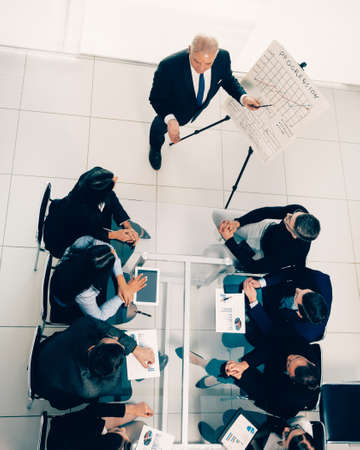 top view. boss at a meeting with the business teamの写真素材
