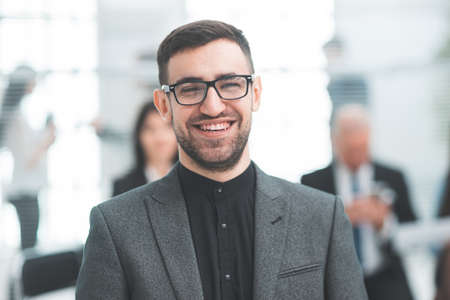 close up. financial consultant sitting in a modern officeの写真素材