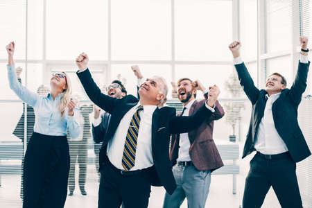 close up. happy business team exulting in the officeの写真素材