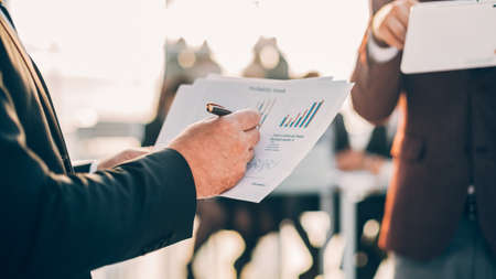 close up. business people analyzing financial data.