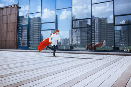 doctor is a superhero rushes through the city streets.の写真素材