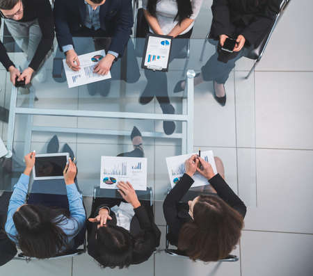 business team discussing financial data at a working meeting