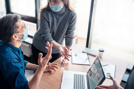 close up. business colleagues discussing urgent issues.の写真素材