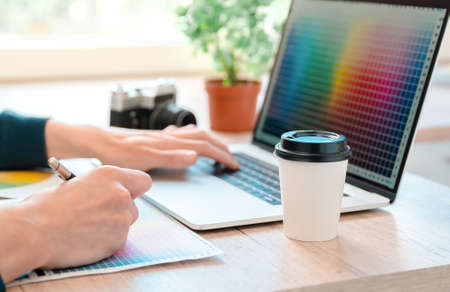close up. male designer working on a laptop .