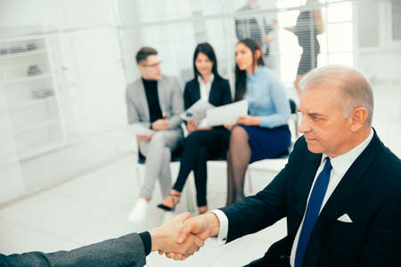 close up. business people shaking hands with each otherの写真素材