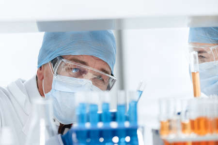 close up. scientists discussing the results of testing a new vaccine.