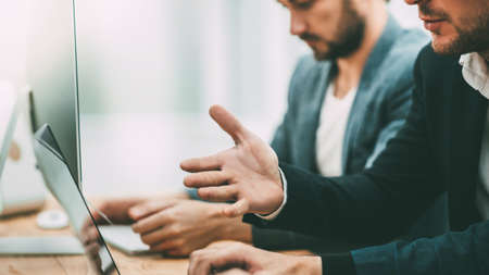 close up. employees analyzing information in the office