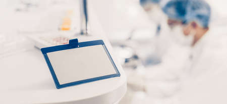 close up. blank badge on the table in the science lab.の写真素材