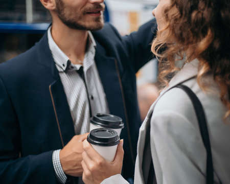 young couple in love, standing in a subway car.の写真素材
