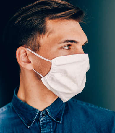 close up. a serious man in a protective maskの写真素材