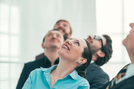 close up. a group of successful entrepreneurs looking up