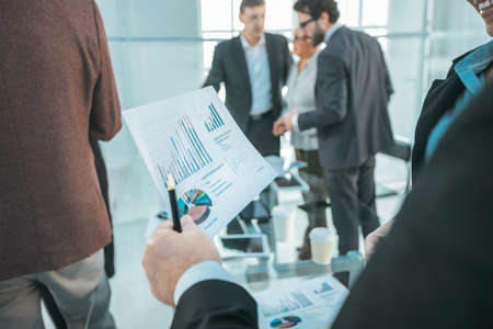 close up. financial chart in the hand of a businessmanの写真素材