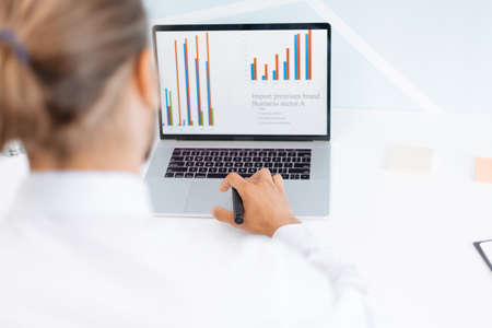 business man analyzing financial diagram . close up.