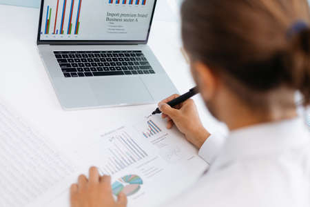 business man analyzing financial diagram . close up.