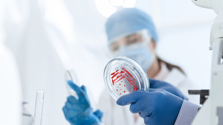 female scientist conducting research in a biological laboratory .
