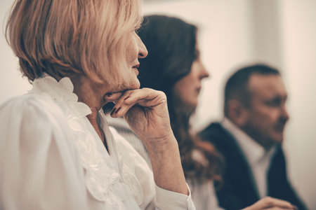 close up. Mature business woman sitting in a conference roomの写真素材