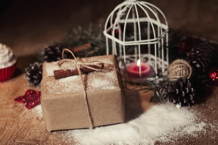 Christmas card. Christmas candle and Christmas giftの写真素材