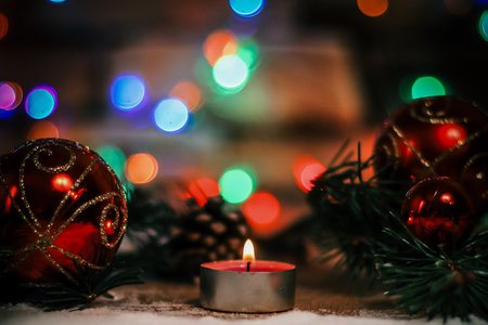 candle and Christmas tree decorations.Christmas festive backgrouの写真素材