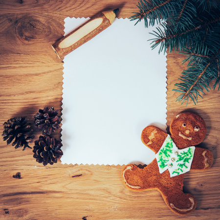 blank sheet of paper on the wooden floor with a pencil