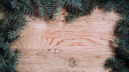traditional green Christmas wreath on wooden backgroundの写真素材