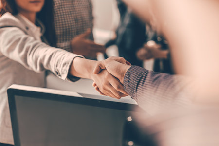 close up. young people shaking hands. business conceptの写真素材