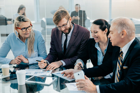 business partners discussing a joint financial project.の写真素材
