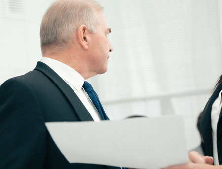 boss and assistant discussing a business document.の写真素材