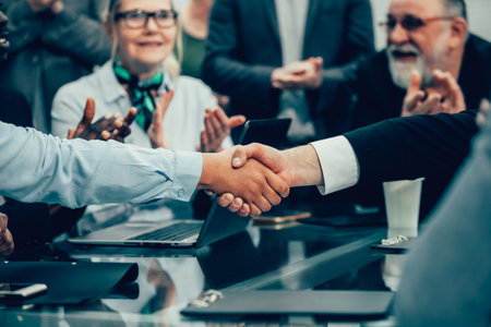 close up. the business team applauds during negotiations.の写真素材