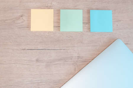 close up. sticky notes and a laptop on the table.の写真素材