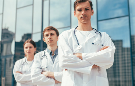 close up. team of doctors standing on a city street.の写真素材