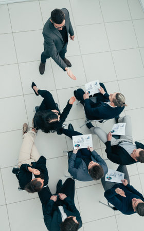 top view. Manager asks questions during a business meeting.の写真素材