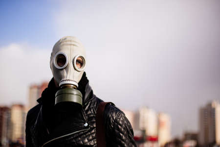 close up. casual guy in a gas mask