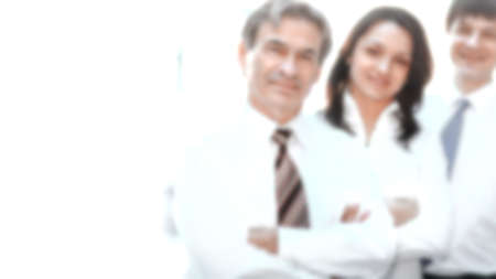 confident business team in the background of the officeの写真素材