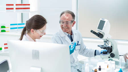 close up. staff of the research lab working on a new vaccine .