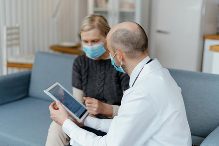 patient is asked questions by the doctor during the consultation.