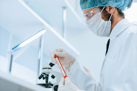 close up. laboratory employee sitting at the laboratory table