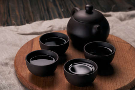 Chinese tea set on a wooden board.の写真素材