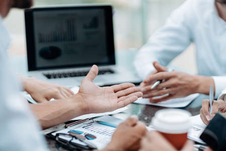 group of business people discussing the financial points of a new contract.の写真素材