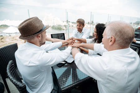 group of young business people showing their unity.