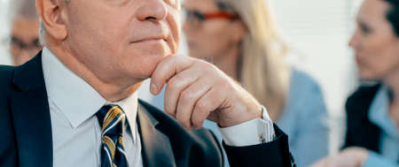 close up. confident adult businessman looking forwardの写真素材