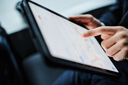 image of a businessman using a digital tablet.の写真素材