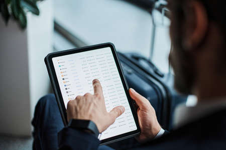 tablet computer in the hands of a business man .close-up.