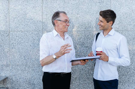 business colleagues talk during a coffee break .の写真素材