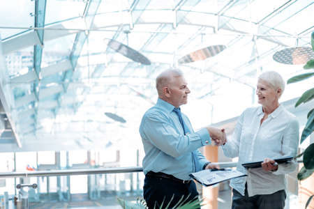 financial business partners in agreement, shaking hands .の写真素材