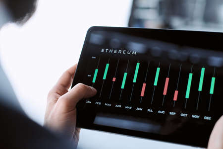 business man looking at the growth of the cryptocurrency exchange rate.