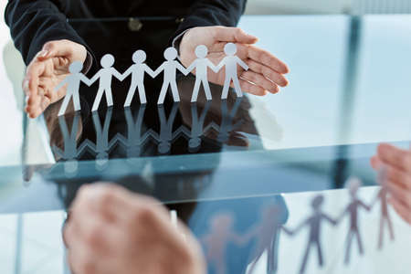 paper business team on the businessmans desk.の写真素材