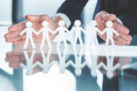 paper business team on the table in front of the businessman.