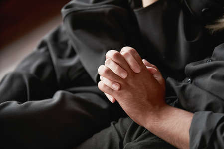image of a man and a woman in love holding each others hands.