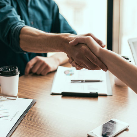 close up. financial partners confirm the transaction with a handshake.の写真素材